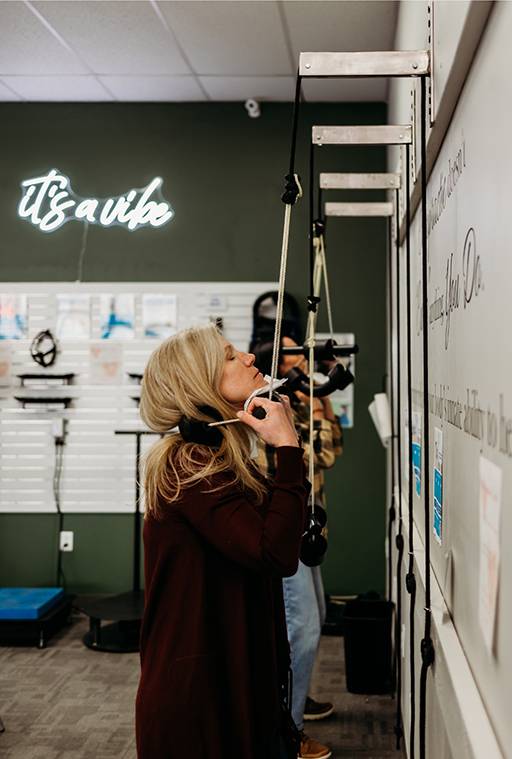 woman using practice equipment
